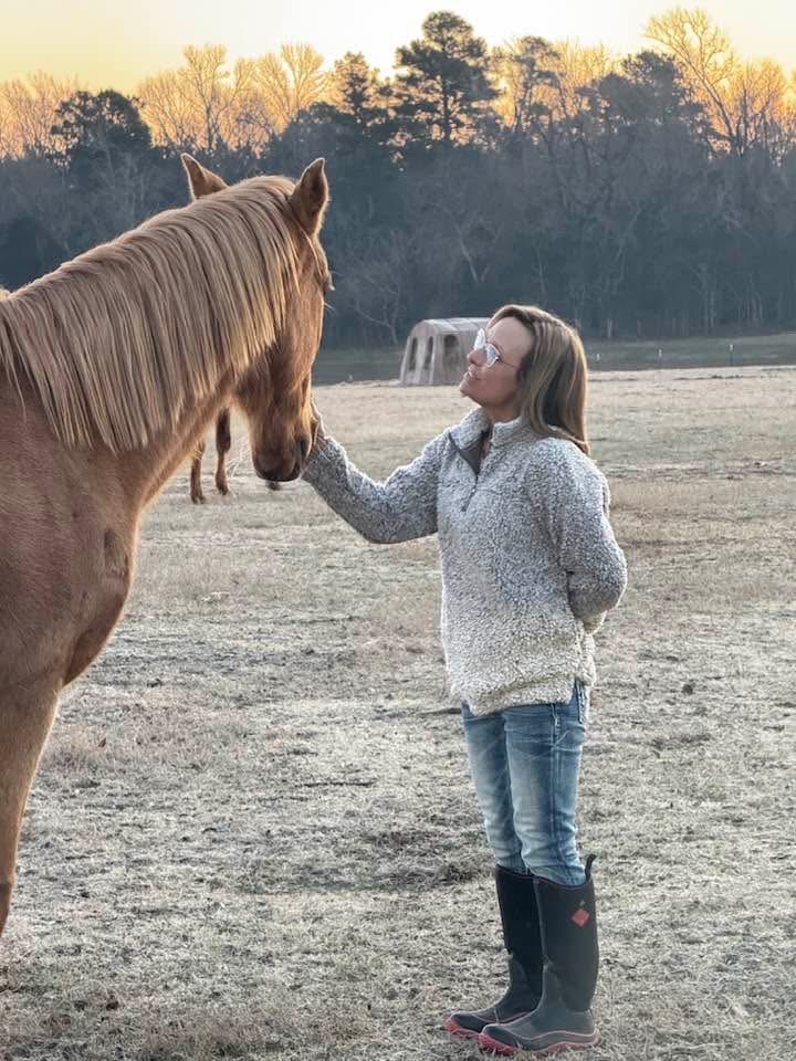 Angie with the horses.